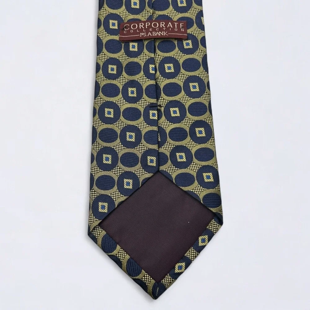 Jos A Bank Necktie Adult Navy Blue Gold Geometric Circles Silk Hand Made In USA